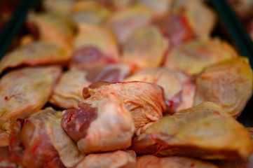 
fresh chicken on a butcher's platter. Meat for sale
