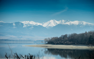 Landscape of a lake with mountain in the background