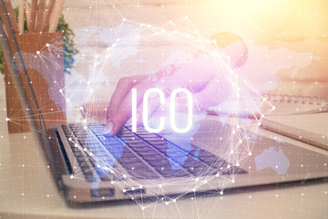 Double exposure of woman hands typing on computer and crypto market theme hologram drawing....
