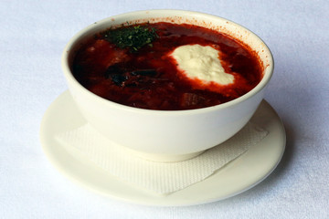 Borscht red beetroot soup with sour cream, dishes of Russian national cuisine