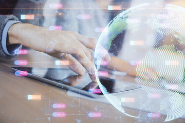 Double exposure of map drawing and man and woman working together holding and using a mobile device. Planet tech concept.