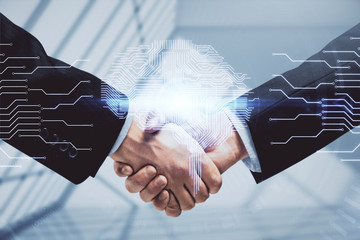 Double exposure of brain hologram and handshake of two men. Partnership in IT industry concept.