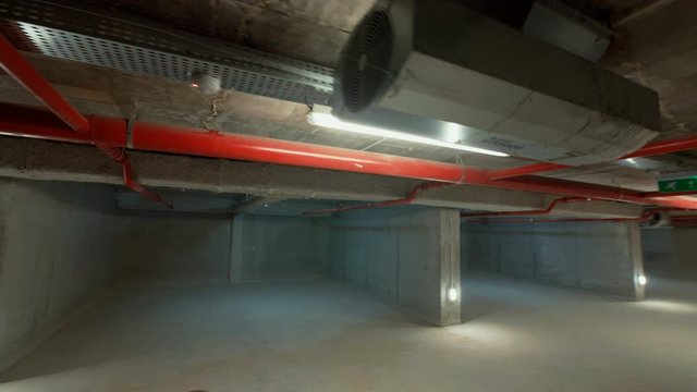 Vintage Underground Parking Garage. Steadicam Panorama Of Empty Underground Parking, 