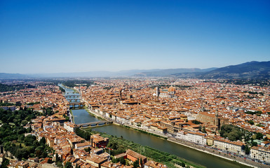 Obraz premium Aerial view of amazing Florence city. Panoramic view to the river Arno, with Ponte Vecchio, Palazzo Vecchio and Cathedral of Santa Maria del Fiore (Duomo), Florence, Italy