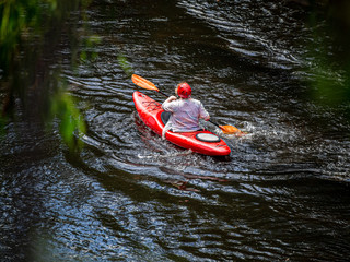 Red Kayak Paddling