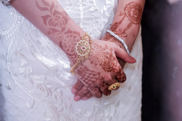 Muslim bride's wearing her jewellery close up