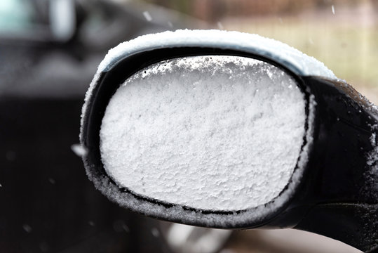 Frozen Car Side Mirror. Morning Frost On The Car. Frost In The Morning. Negative Temperature And Car Preparation For Winter Travel.