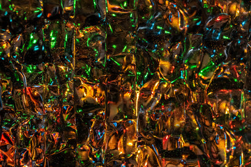 Abstract view of crushed water bottle with lights