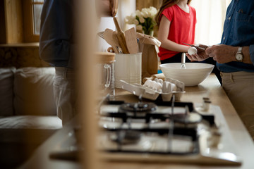 Kitchen utensils and person cooking stock photo