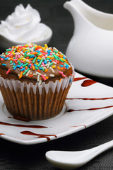 cupcake with frosting and sprinkles