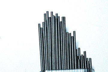 Mechanical pencil leads. Transparent plastic box. Close up.