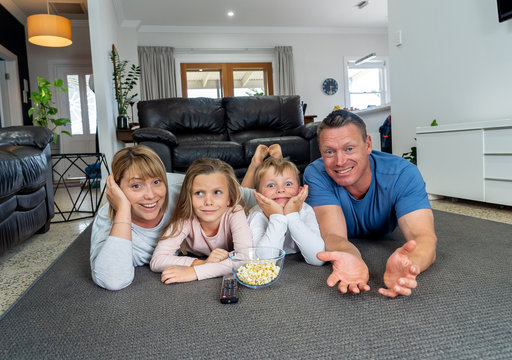 Covid-19 Stay at home, save lives. Family in staying home happy to stop the coronavirus spreading.