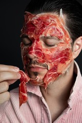 portrait of a man with mask mad of meat