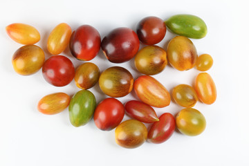 Fresh ripe mixed tomato verity assorted color on white background
