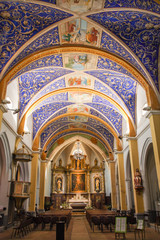 Fototapeta na wymiar Restored classic medieval blue ultramarine ceiling in Notre Dame De L