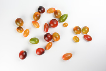 Fresh ripe mixed tomato verity assorted color on white background