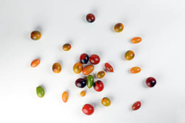 Fresh ripe mixed tomato verity assorted color on white background