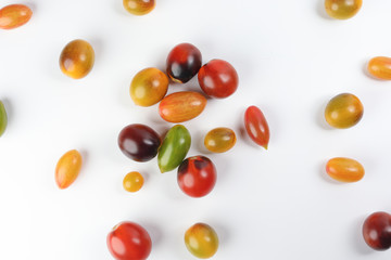 Fresh ripe mixed tomato verity assorted color on white background