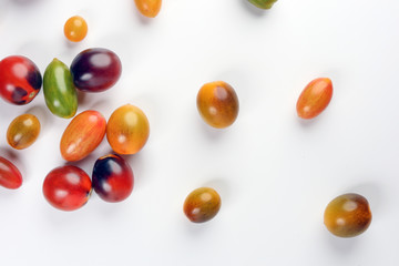 Fresh ripe mixed tomato verity assorted color on white background