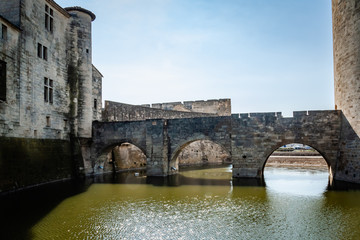 Fototapeta na wymiar Medieval bridge with arches in Aigues-Mortes