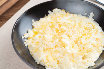 Creamy and soft banana pudding with puff pastry crumbs on the top