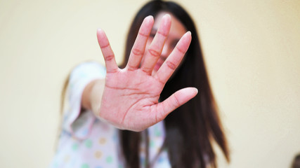 sexual abuse for women gender in society, a girl hand is stopping harassment on the bedroom of...