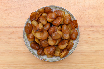 top view salty broad or fava beans on a dish