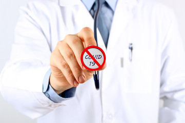 Doctor holding stethoscope  with  covid 19. Stop Coronavirus