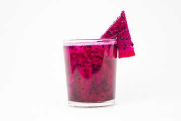 Glass containing red dragon fruit 