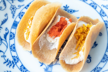 Thai food, Thai Dessert kind of Thai crispy pancake with sweet coconut, thai name Kanom Buang