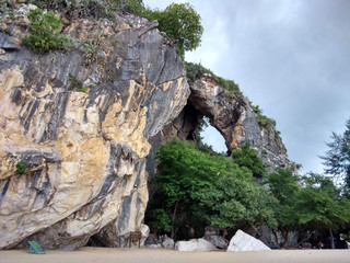 Rocky mountain, resembling a skull by the sea called Thao Kosa frorest park or khao ka lok Prachuap Khiri Khan thailand