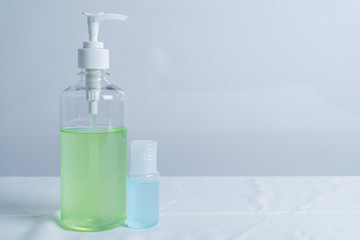 Pressed hand sanitizer on white background.