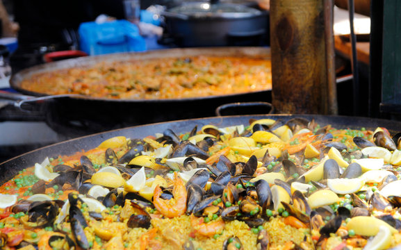 Seafood Paella cooking in a big Pan at Borough Market, London, UK