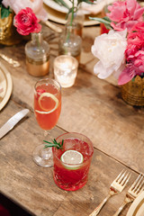 Her champagne and his gin and tonic signature wedding drinks