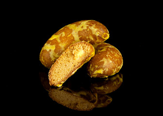 gingerbread with banana filling in the section on black background