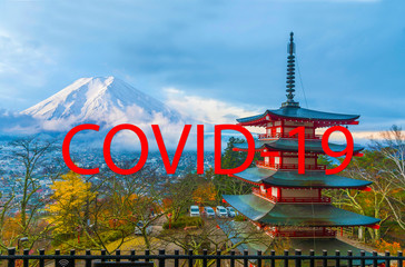 COVID-19 coronavirus outbreak text on skyscraper modern city tower, office building to prevent COVID-19 spreading Japan lockdown