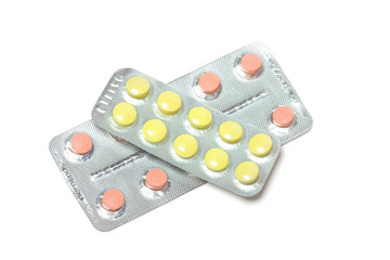 blister packs of pills isolated over white