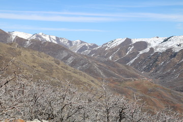 Wasatch Mountain Range in early spring from summit of Mt Van Cott, Salt Lake City, Utah, USA