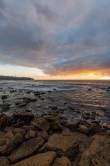 A rocky coastline at Bronte Beach, Sydney during low tide.