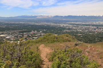Obraz premium Mt Van Cott hiking trail looking west towards Salt Lake City and Oqquirh Mountain range