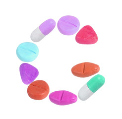 miniature drug model arrange in alphabet isolated on white background