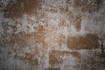 testur grey concrete wall with white plaster. brown-grey concrete background