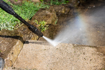 Cleaning stairs with a high pressure cleaner