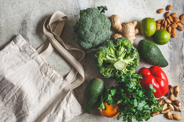 Zero waste plastic free concept. Fresh farm vegetables and a white eco bag.