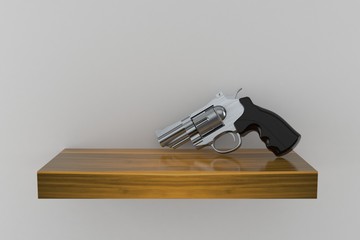 Gun on wooden shelf