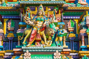 Sculpture of the god Shiva in the form of the ancient Hindu temple Sri Bhadrakali Amman Kovil (Kali Kovil) close-up. Trincomalee, Sri Lanka. - obrazy, fototapety, plakaty