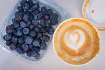 blueberries in a cup pf coffee