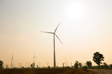 Fototapeta na wymiar Wind turbines for electric power production. Green ecological power energy generation.