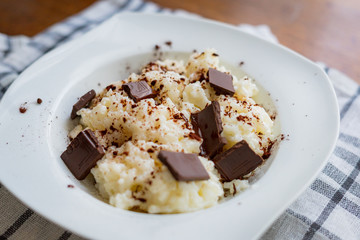 rice with milk and chocolate on a towel