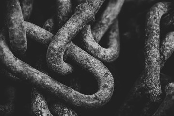thick big old chain on a dark background